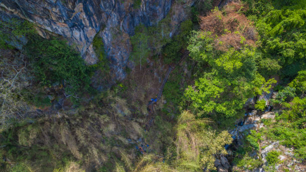 istock stairway to hill top new bridge beside the cliff. 994495874