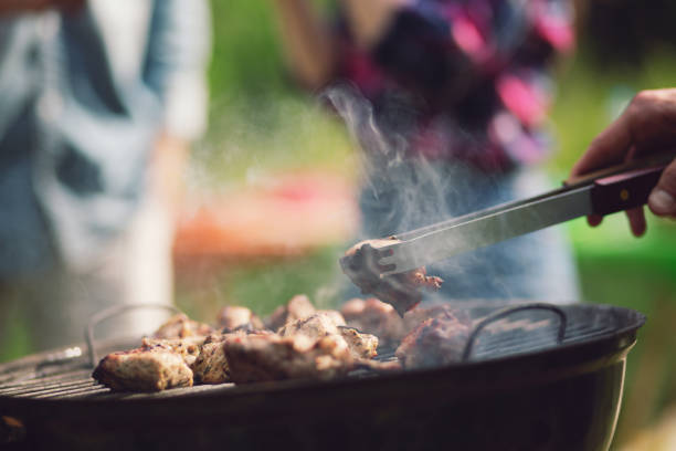 istock Meat frying on grill outdoors 994509988