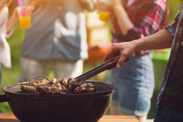 istock Meat frying on grill outdoors 994510034