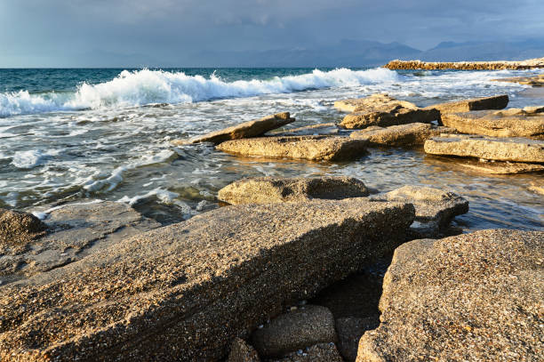 istock rocks on the coast of island 994512980
