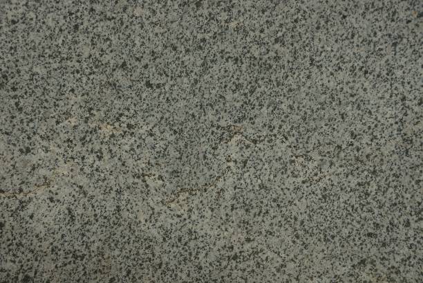 istock gray black stone texture from a piece of marble 994513982