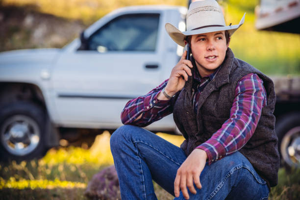 istock Young Utah Cowboy phoning 994525094