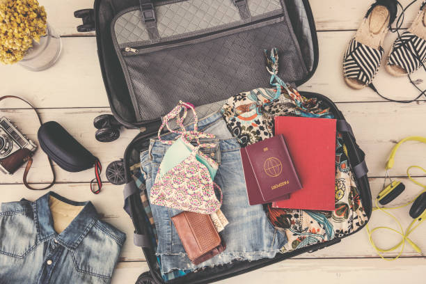 istock Summer travel preparation concept high angle view 994531020