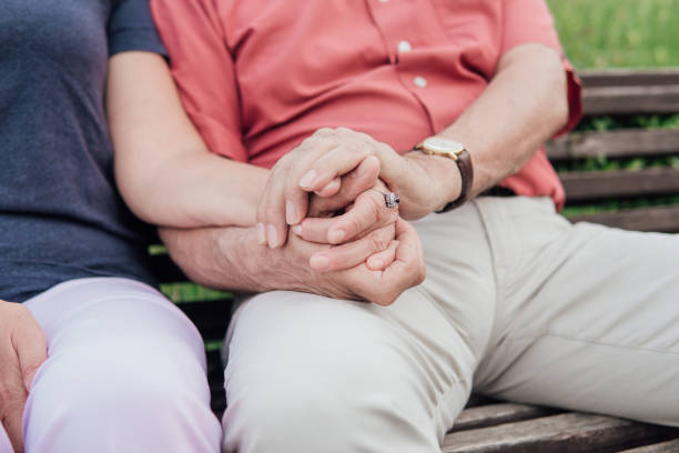 istock Senior couple holding hands 994531128