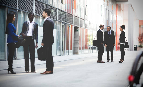 Business people walking downtown business district