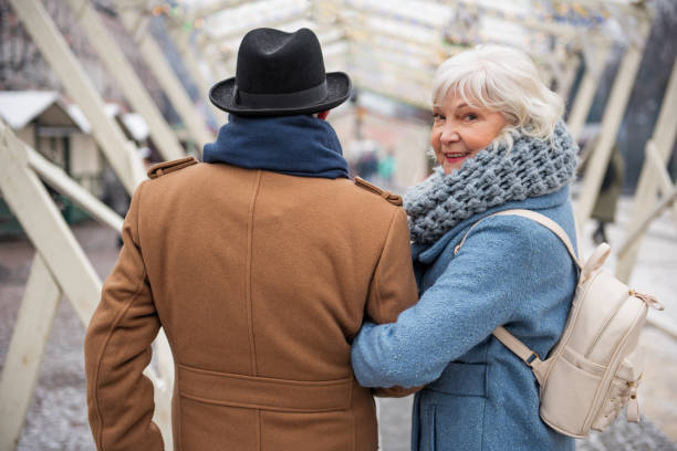istock Joyful senior lady enjoying walk with her husband 994586814