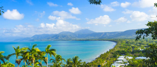 Port Douglas in North Queensland, Australia on a perfect day Poet Douglas is one of North Queensland's popular tourist locations in Australia and is located just north of Cairns cairns australia stock pictures, royalty-free photos & images