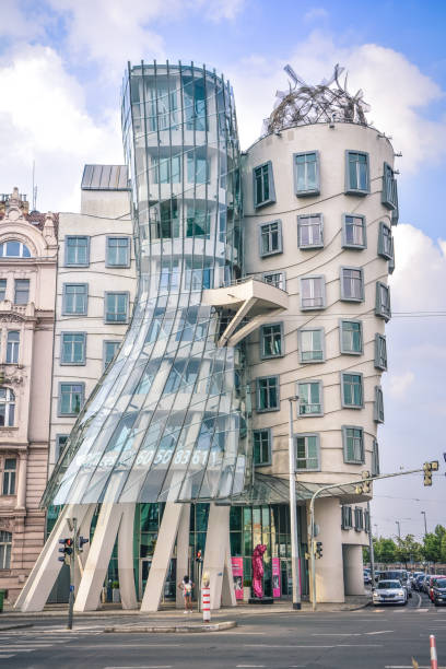 Dancing house City landscape in with its significant buildings in Prague. This one is better known for its architecture as the dancing house. dancing house prague stock pictures, royalty-free photos & images