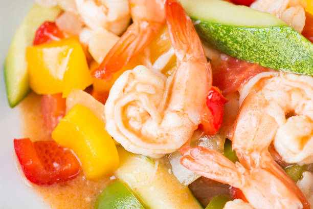 sweet and sour sauce fried with seafood shrimp squid , asian chinese food
