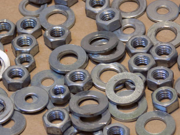 istock A pile of nuts and washers as a background 994631840