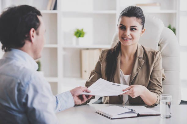 istock Young Smiling Businesswoman Interviewing Employee. 994637232