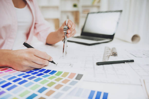 istock Close up. Designer Works with Laptop and Notes. 994645436