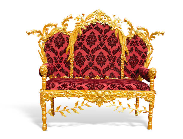 istock Old red golden king throne isolated over white background. 994652380