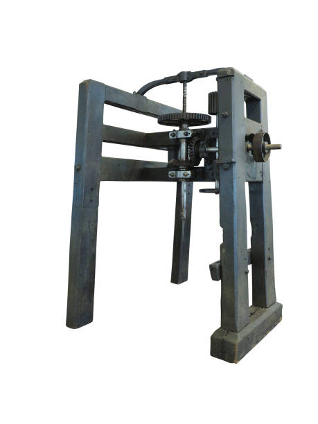 istock Vintage old wooden drilling machine isolated over white 994652452