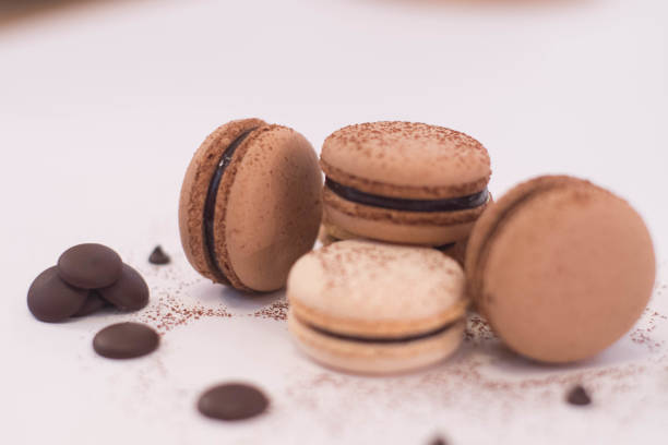 istock stack of chocolate macarons decorate with chocolate seeds and chocolate powder. 994680460