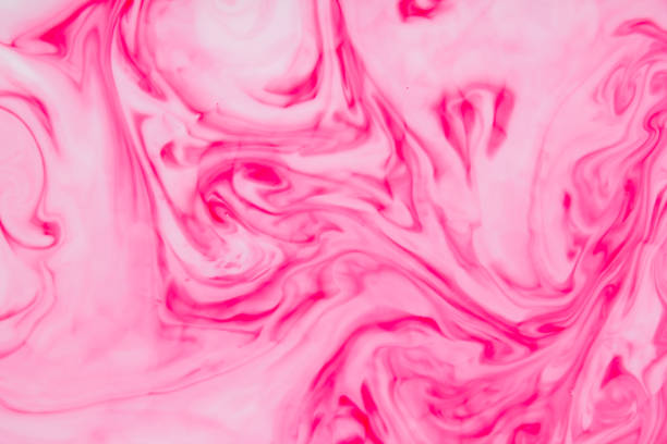 istock Abstract pink background on liquid, texture with paints, white pink pattern for designer, abstract pattern of food dyes on milk, blank for designer 994710664