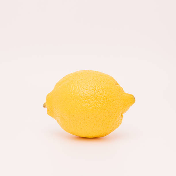 istock A fresh yellow lemon isolated on white background. 994728104