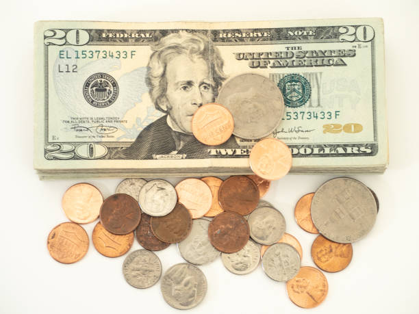 istock A Stack of US Twenty Dollar Bills and Coins From Above 994736114