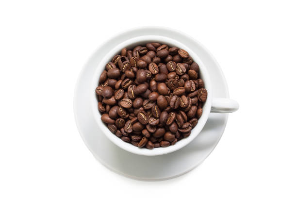 une tasse de café en grains - bean coffee bean heap white photos et images de collection