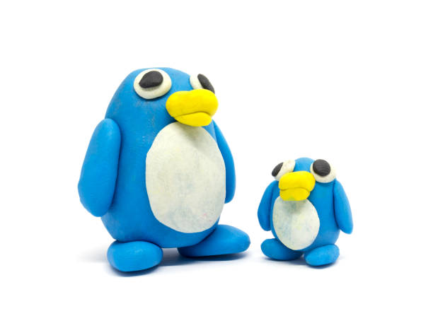 istock Play dough Penguin father and son on white background 994748398