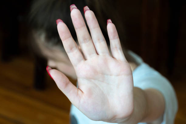 istock Young woman with hand stop gesture 994761758