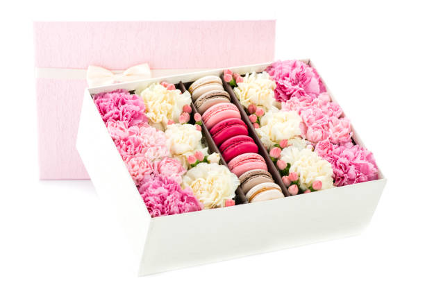 istock flowers and macaroons in the gift box 994764750