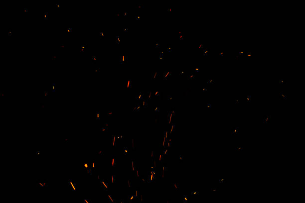 黒い背景に火花と火 - 火 ストックフォトと画像