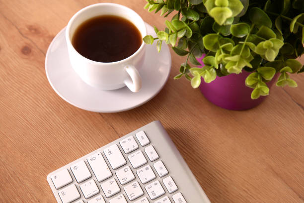 istock Office desk table with computer, supplies and coffee cup 994789706