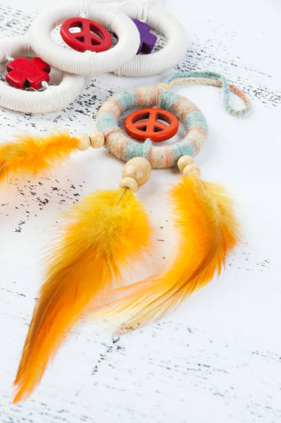 istock Bright dream catcher with an orange peace sign 994790144