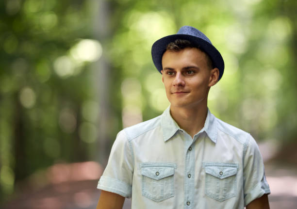 istock Handsome teenager in the park 994793010
