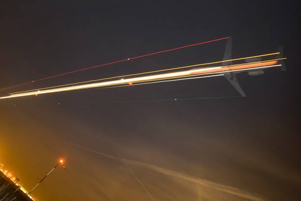 istock Airplane in sky at night 994795842