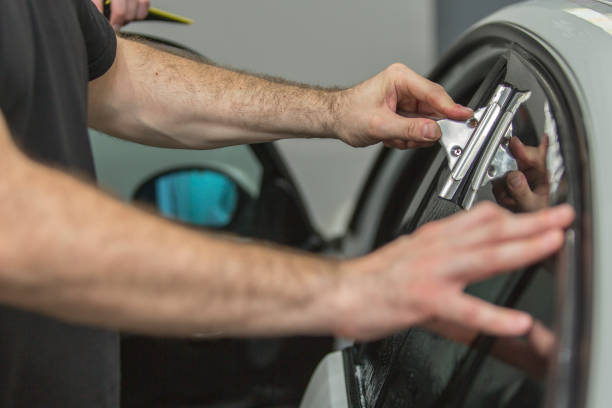 istock applying  Car Window Tint to Your Vehicle 994804720