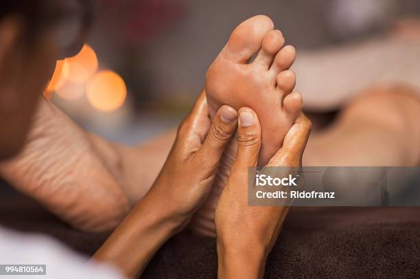 Foot Reflexology Massage Stock Photo - Download Image Now - Massaging, Foot, Reflexology