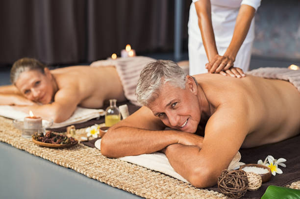 istock Mature couple in spa getting massage 994810646