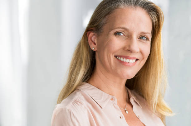 istock Senior woman smiling face 994813126