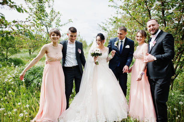 istock Groomsmen with bridesmaids and wedding couple 994814038