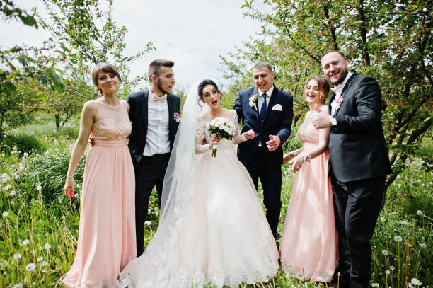 istock Groomsmen with bridesmaids and wedding couple 994814040