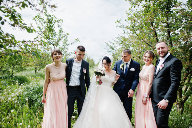 istock Groomsmen with bridesmaids and wedding couple 994814046