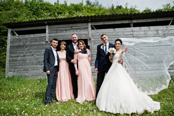 istock Groomsmen with bridesmaids and wedding couple 994814150