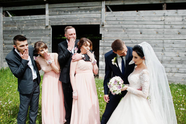 istock Groomsmen with bridesmaids and wedding couple 994814192