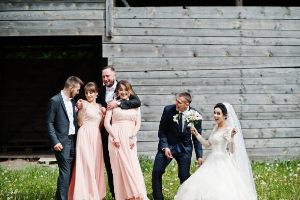 istock Groomsmen with bridesmaids and wedding couple 994814268