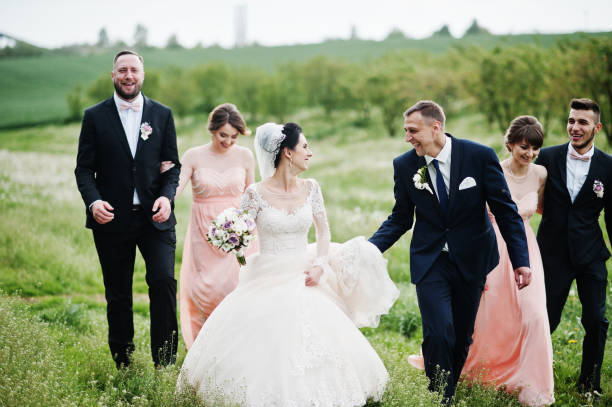 istock Groomsmen with bridesmaids and wedding couple 994814538