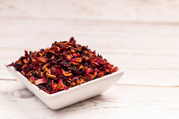 istock Tea with flowers in square plate 994817508