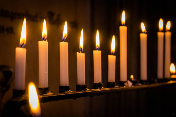 istock Many burning candles with shallow depth of field 994817632