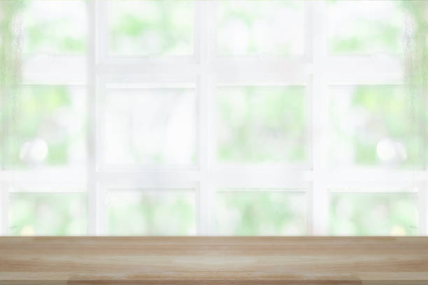 istock Empty wooden table and window room interior decoration background, product montage display,can be used for display or montage your products.Mock up for display of product. 994820452