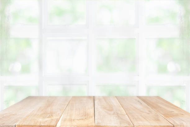 istock Empty wooden table and window room interior decoration background, product montage display,can be used for display or montage your products.Mock up for display of product. 994820460