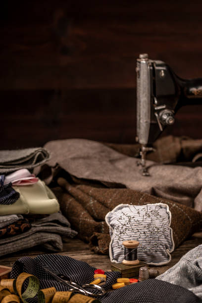 istock Vintage sewing set on old wooden table 994820676