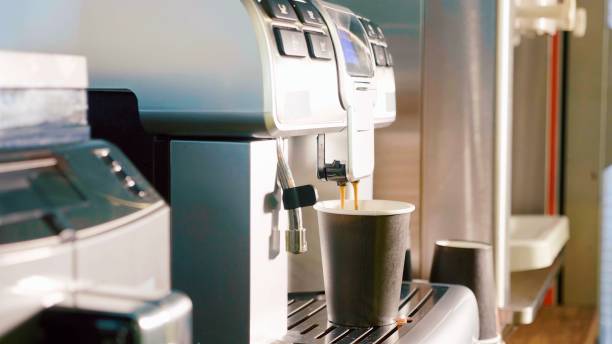 istock Process of making coffee by coffee machine pour coffee into the cup 994837502