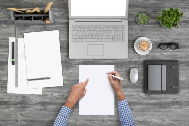 istock Architect designer writing on a blank piece of paper, copy space template - top view 994842340