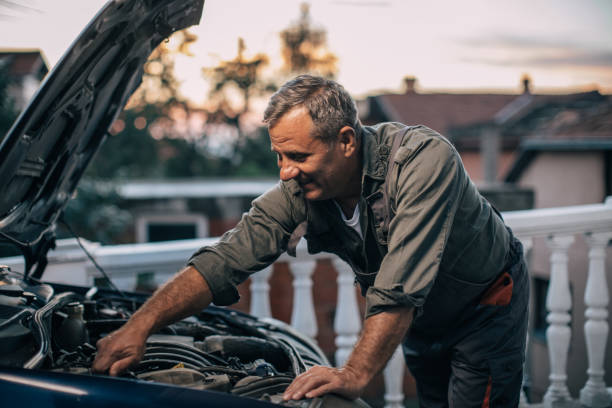 istock Mechanic repairing car 994845394